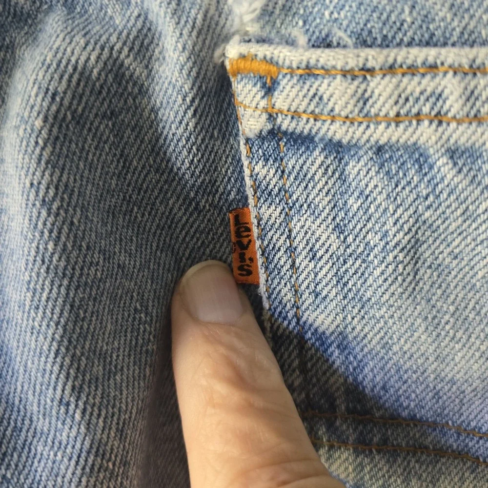 Vintage Levis 550 Relaxed Fit Tapered Leg Light Wash Orange Tab Jeans 40x32 Mens
